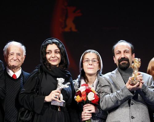 Members of the film 'Jodaeiye Nadar Az Simin'receive the Golden Bear aword for best film