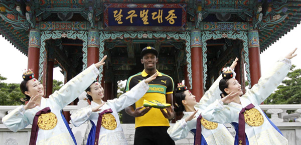 Jamaica poses wearing traditional Hanbok in Daegu