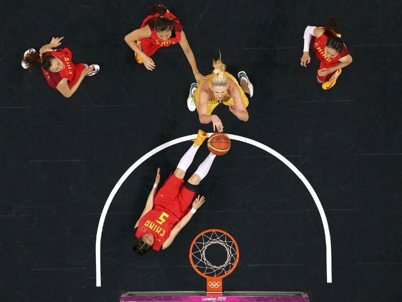 Australia's Lauren Jackson (15) shoots over China's Song Xiaoyun (5) in the women's quarterfinal basketball match at the Basketball Arena in London during the London 2012 Olympic Games, Aug 7, 2012. Reuters images of the year 2012 - China