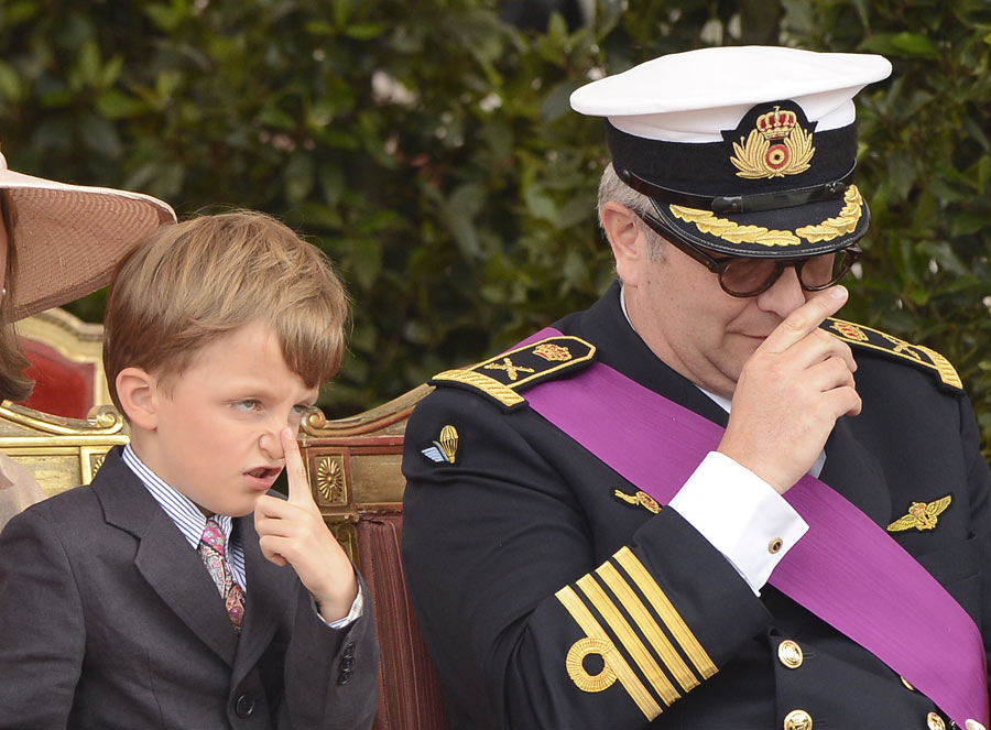 Belgian Prince Nicolas (L) and his father Prince Laurent watch the military parade in Brussels, capital of Belgium, July 21, 2012, on the occasion of the Belgian National Day. Xinhua world images of the year 2012