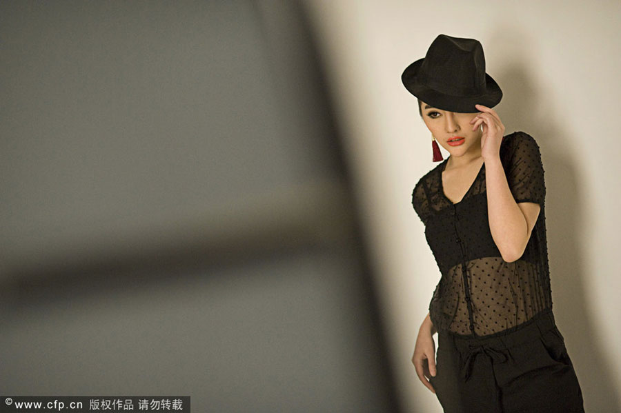 Xia Chenjie poses in Hangzhou on Feb 16, 2012. Xia won third place in the 2011 Taobao models contest. Taobao models live for clothes