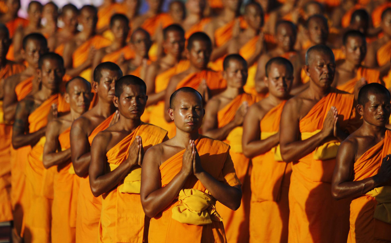 Buddhists monks pray at a temple in Suphan Buri province Jan 9, 2013. Buddhist monks were attending a traditional pilgrimage to pay homage to Lord Buddha and bless Thailand as it enters the new year. Buddhist monks pray for new year in Thailand