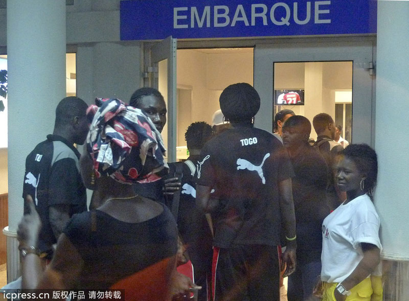 Togo's players seen at the Cabinda airport, Angola, Jan 10, 2010. Attacks and threats affected sporting events in history