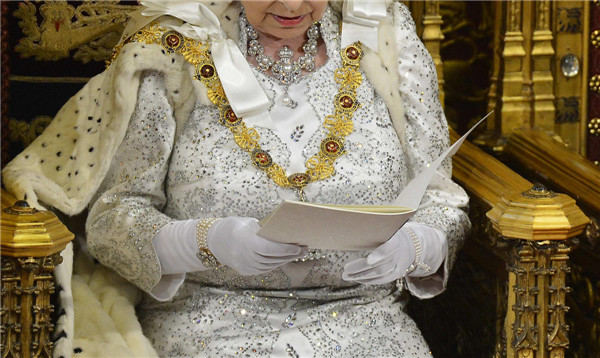 Britain's Queen Elizabeth delivers her speech in the House of Lords, during the State Opening of Parliament at the Palace of Westminster in London May 8, 2013. Queen Elizabeth opens Parliament