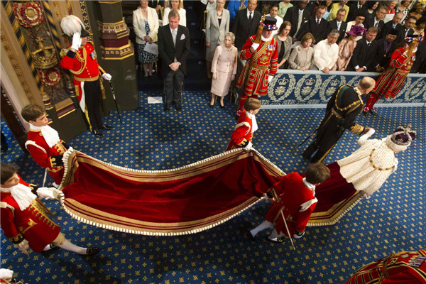 Britain's Queen Elizabeth delivers her speech in the House of Lords, during the State Opening of Parliament at the Palace of Westminster in London May 8, 2013. Queen Elizabeth opens Parliament