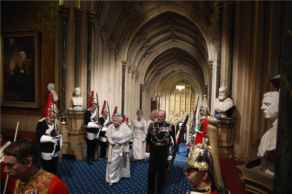 Britain's Queen Elizabeth delivers her speech in the House of Lords, during the State Opening of Parliament at the Palace of Westminster in London May 8, 2013. Queen Elizabeth opens Parliament