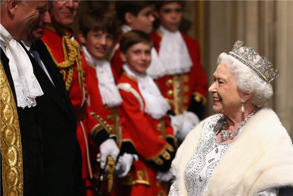 Britain's Queen Elizabeth delivers her speech in the House of Lords, during the State Opening of Parliament at the Palace of Westminster in London May 8, 2013. Queen Elizabeth opens Parliament