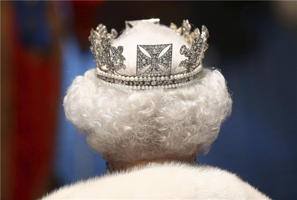 Britain's Queen Elizabeth delivers her speech in the House of Lords, during the State Opening of Parliament at the Palace of Westminster in London May 8, 2013. Queen Elizabeth opens Parliament