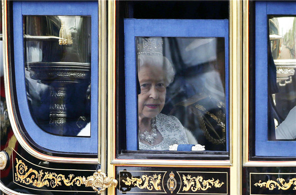 Britain's Queen Elizabeth delivers her speech in the House of Lords, during the State Opening of Parliament at the Palace of Westminster in London May 8, 2013. Queen Elizabeth opens Parliament