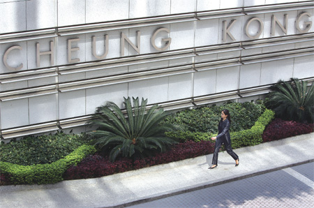 Cheung Kong to obey new flat rules early