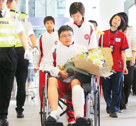 Baseball team returns home in shock