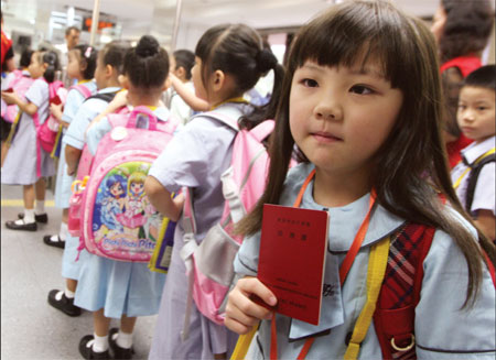 Kids late for school as tangled in red tape