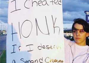 美國19歲出軌女子舉牌認錯欲挽回感情