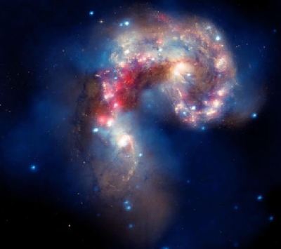 新照片揭示遙遠(yuǎn)星系相撞奇觀 璀璨耀眼美輪美奐