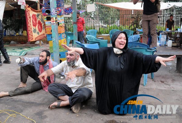埃及對穆爾西支持者清場 穆兄會稱數(shù)百人亡（組圖）
