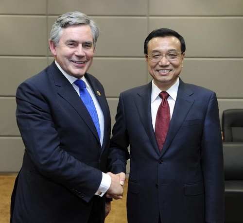 國務(wù)院總理李克強(qiáng)11日在大連會見英國前首相布朗