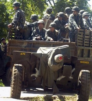 菲武裝分子血洗村莊11人亡 遭綁仨月兩中國(guó)公民獲救