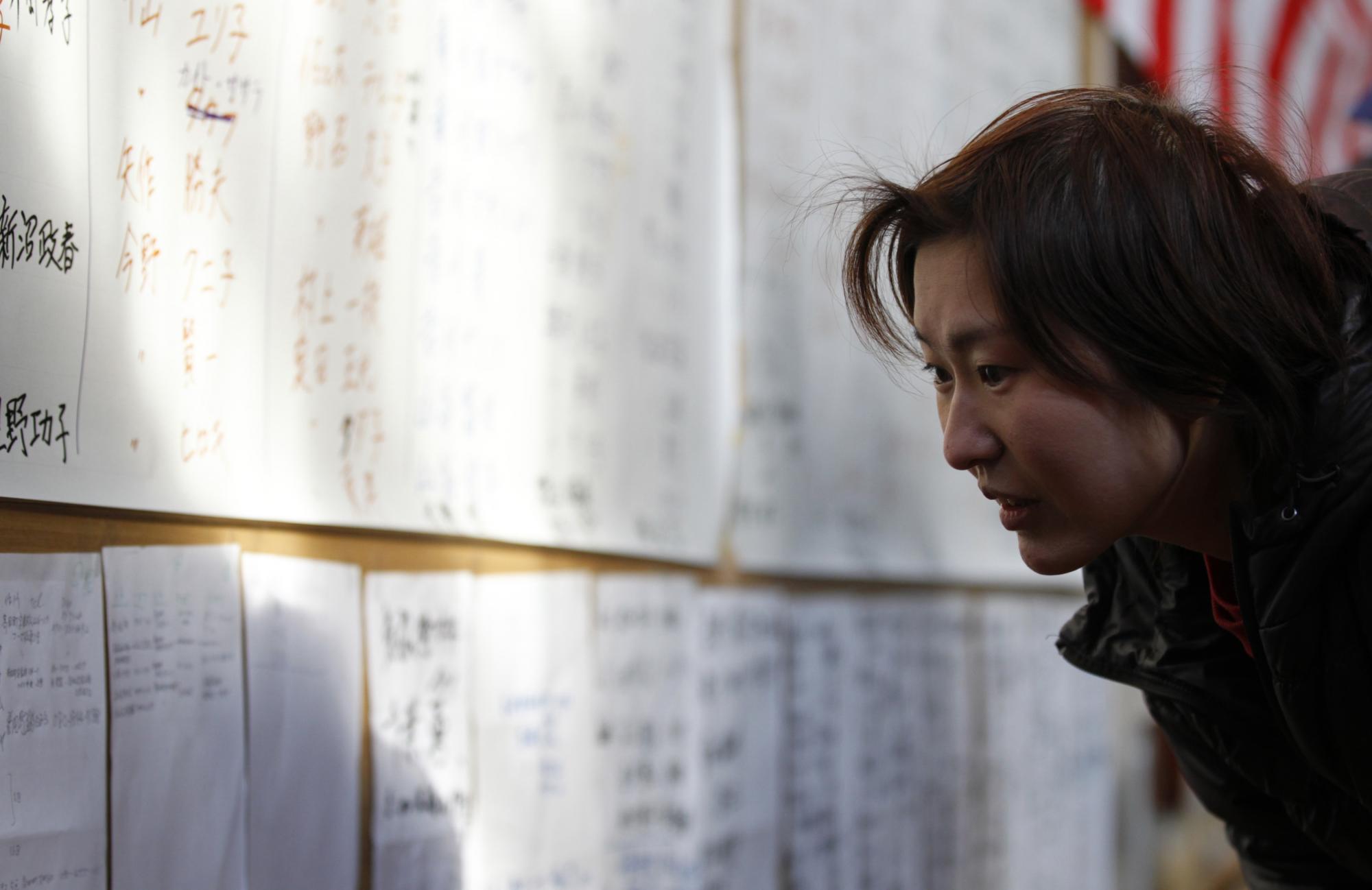 組圖：日強震廢墟中的家庭合影 救援人員全力搜救