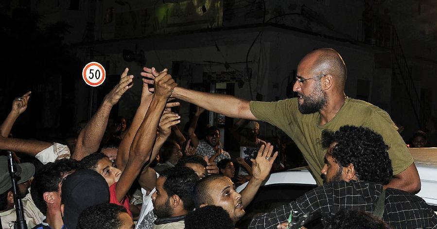 兩個兒子“重獲自由” 卡扎菲曾經“身邊人”何去何從