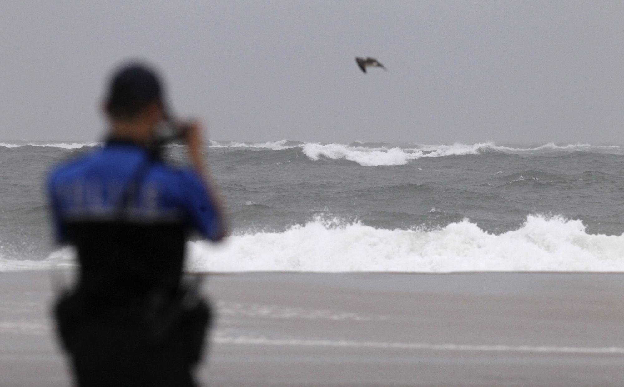 組圖:颶風(fēng)“艾琳”襲擊美國(guó)東海岸 民眾淡定應(yīng)對(duì)