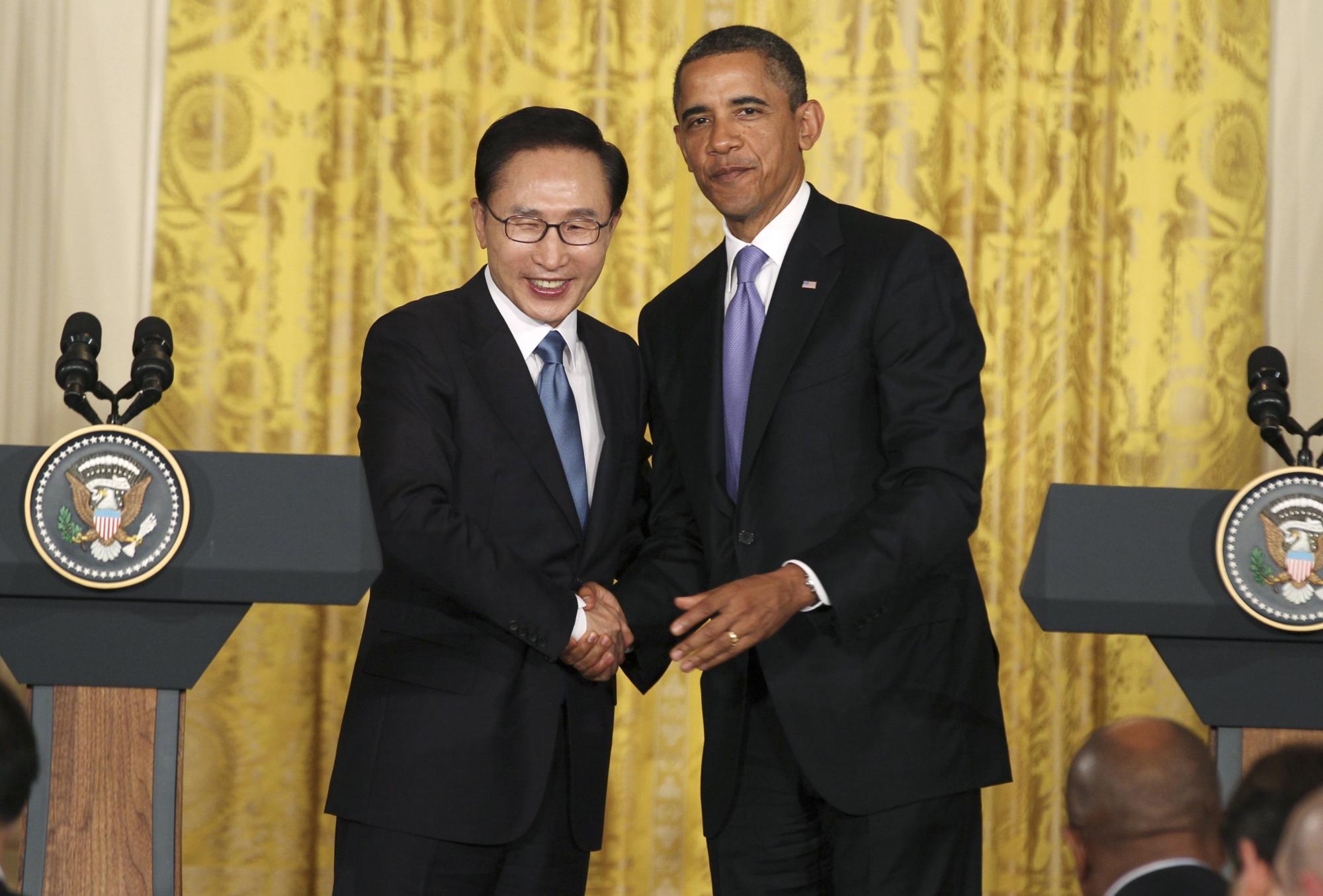 李明博美國行收獲多 自貿協定有望加深同盟關系