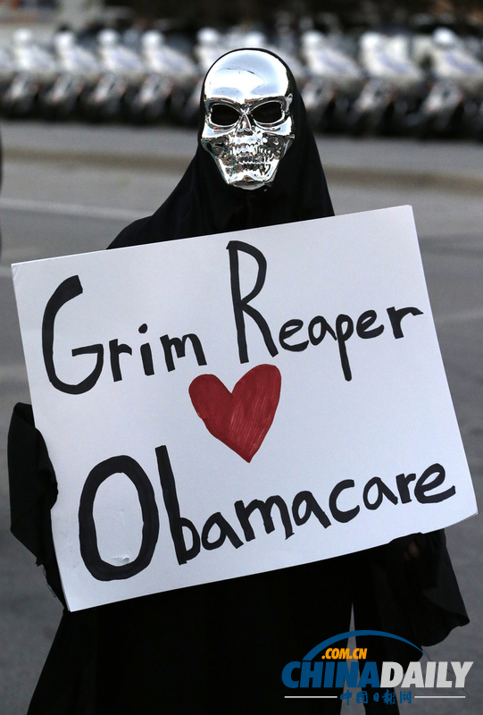 奧巴馬奔走得州宣傳醫改法案 遭民眾舉牌“彈劾”（組圖）