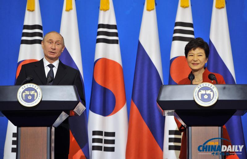 普京訪韓與樸槿惠干杯 兩位單身總統“擦出火花”（組圖）