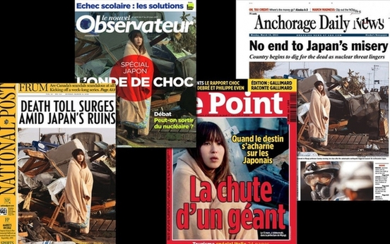 日本地震一周年 經典照片背后的故事