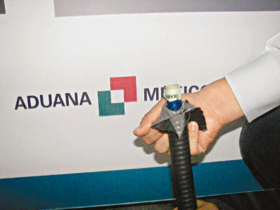 墨西哥毒販240萬美元現鈔藏電話線中被識破(圖)