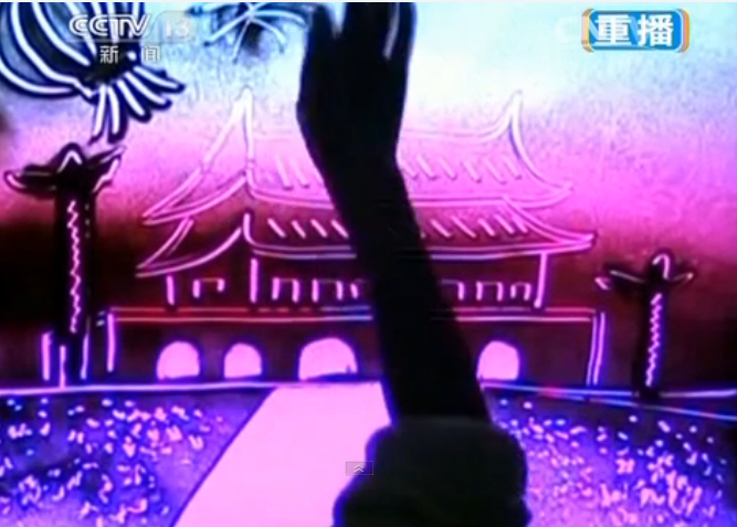 《新聞聯播》最文藝結尾 網友做沙畫祝福兩會