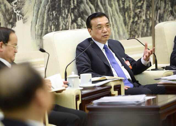 李克強參加江西代表團討論 揪心失聯(lián)飛機乘客
