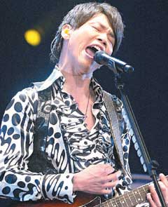 臺灣第21屆金曲獎提曉 張惠妹陶喆封后稱王(組圖)