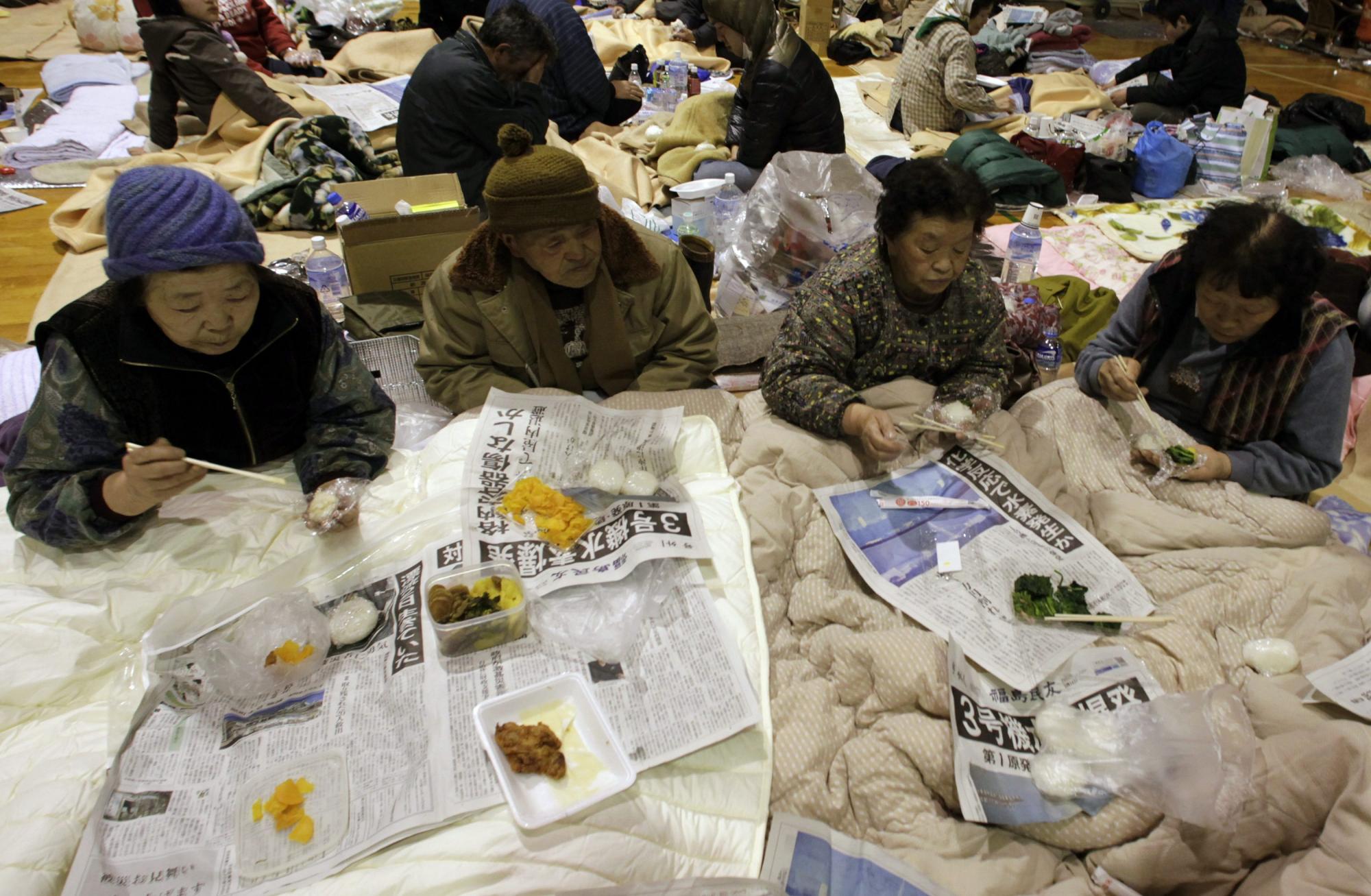 生老病死情何堪 日本災(zāi)區(qū)蕓蕓眾生相
