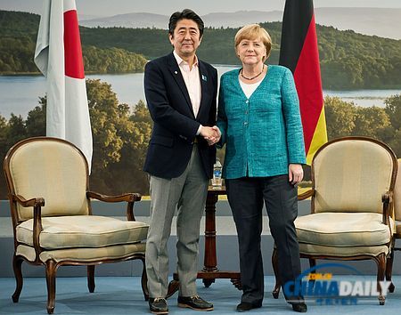 默克爾批評(píng)安倍日元貶值政策 指其殃及他國(guó)