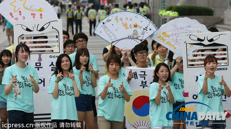 韓國青年不懼高溫 動感舞蹈呼吁夏季節約用電（圖）