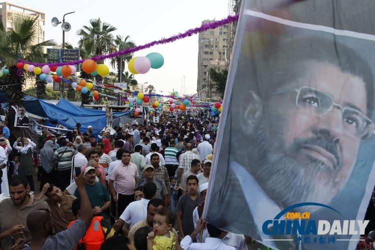 穆爾西妻子現身為支持者打氣 稱丈夫“會回來的”