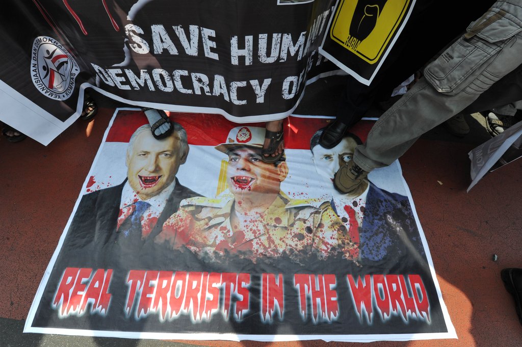 印尼數(shù)千穆斯林集會(huì)聲援埃及民眾 痛批奧巴馬（圖）