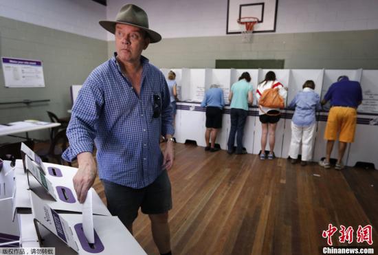 澳媒:澳大利亞大選結(jié)果公布 阿博特戰(zhàn)勝陸克文