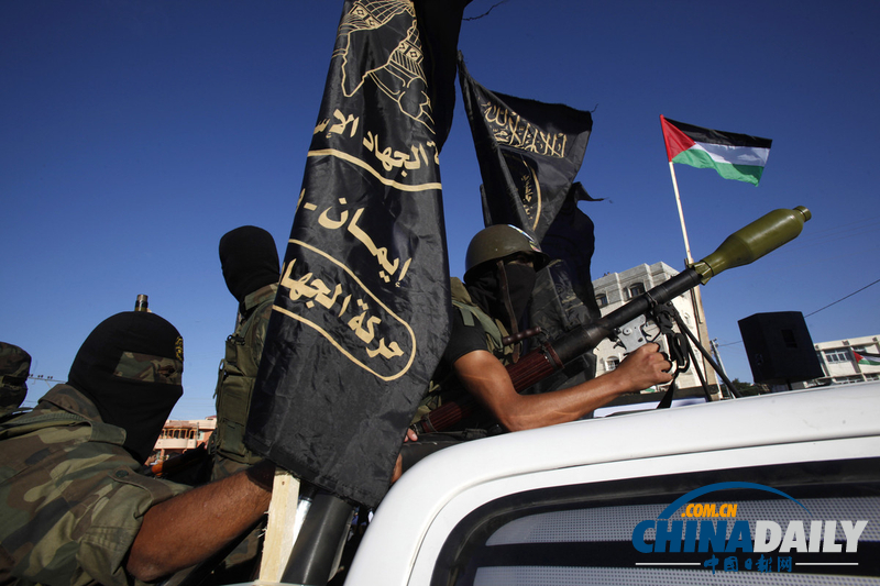 加沙伊斯蘭圣戰(zhàn)組織成員全副武裝舉行集會(huì)（圖）