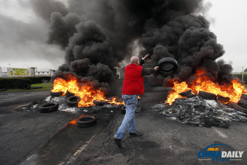 法國：固特異公司雇員焚燒輪胎抗議遭解雇（組圖）