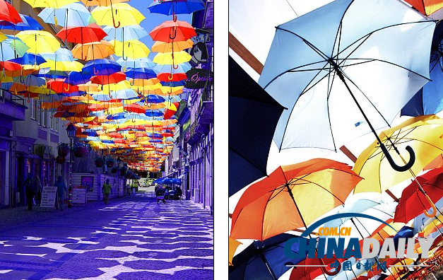 五彩雨傘漂浮半空中 葡萄牙小鎮用雨傘打造童話世界
