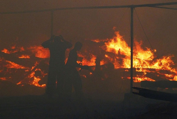 Forest fires spread through Central Russia