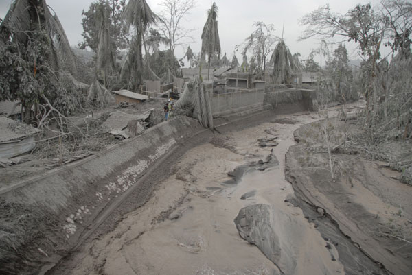 Underneath a volcano, Indonesia sees uncommon type of suffering