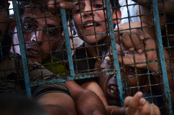 Gaza truce talks push into third day as midnight deadline looms