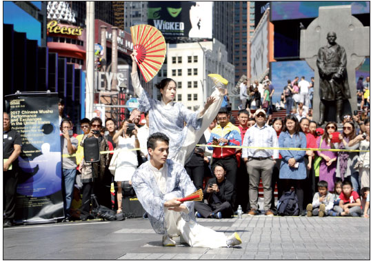 Tai chi lights up Times Square