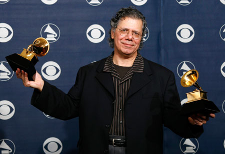 Chick Corea poses with his Grammys for Best Instrumental Arrangement for