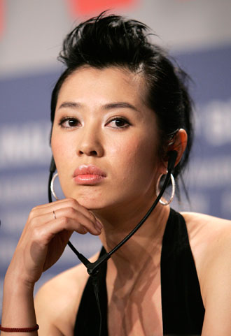 Actress Nan Yu listens during a news conference to present the film 'Tuya's Marriage' running in competition at the 57th Berlinale International Film Festival in Berlin February 10, 2007. The festival runs from February 8-18.