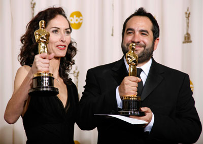 Winners for Best Art Direction Eugenio Caballero (R) and Pilar Revuelta of