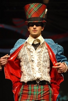 A model presents one of the dresses by young Hungarian designer, Szilvia Papp during the three-day Wella Fashion Show in Budapest, Hungary Saturday, March 3, 2007.