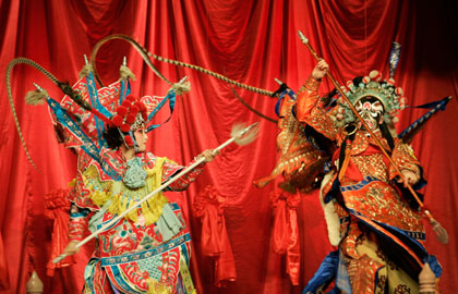 Beijing opera actors perform before a news conference for Chinese director Chen Kaige's production of Mei Lanfang in Beijing July 19, 2007. Veteran director Chen Kaige, best known in the West for
